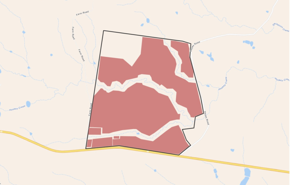 Artist impression of a large-scale solar farm with battery storage facility in a rural Australian landscape under clear skies.