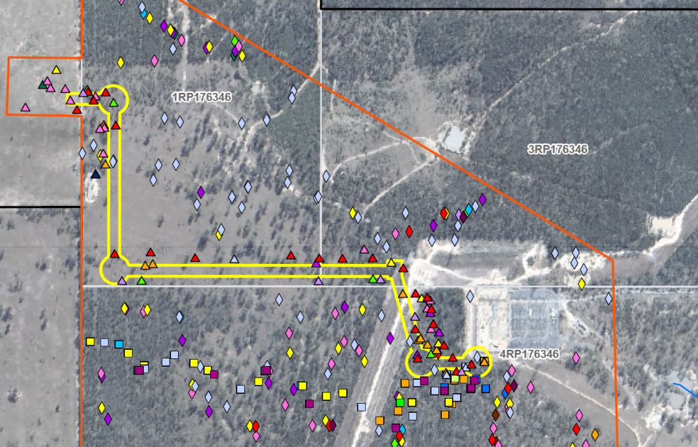 Excavators and trenching crews install underground high-voltage cabling across flat grazing land near Hopeland, linking a new battery storage facility to the Western Downs grid.